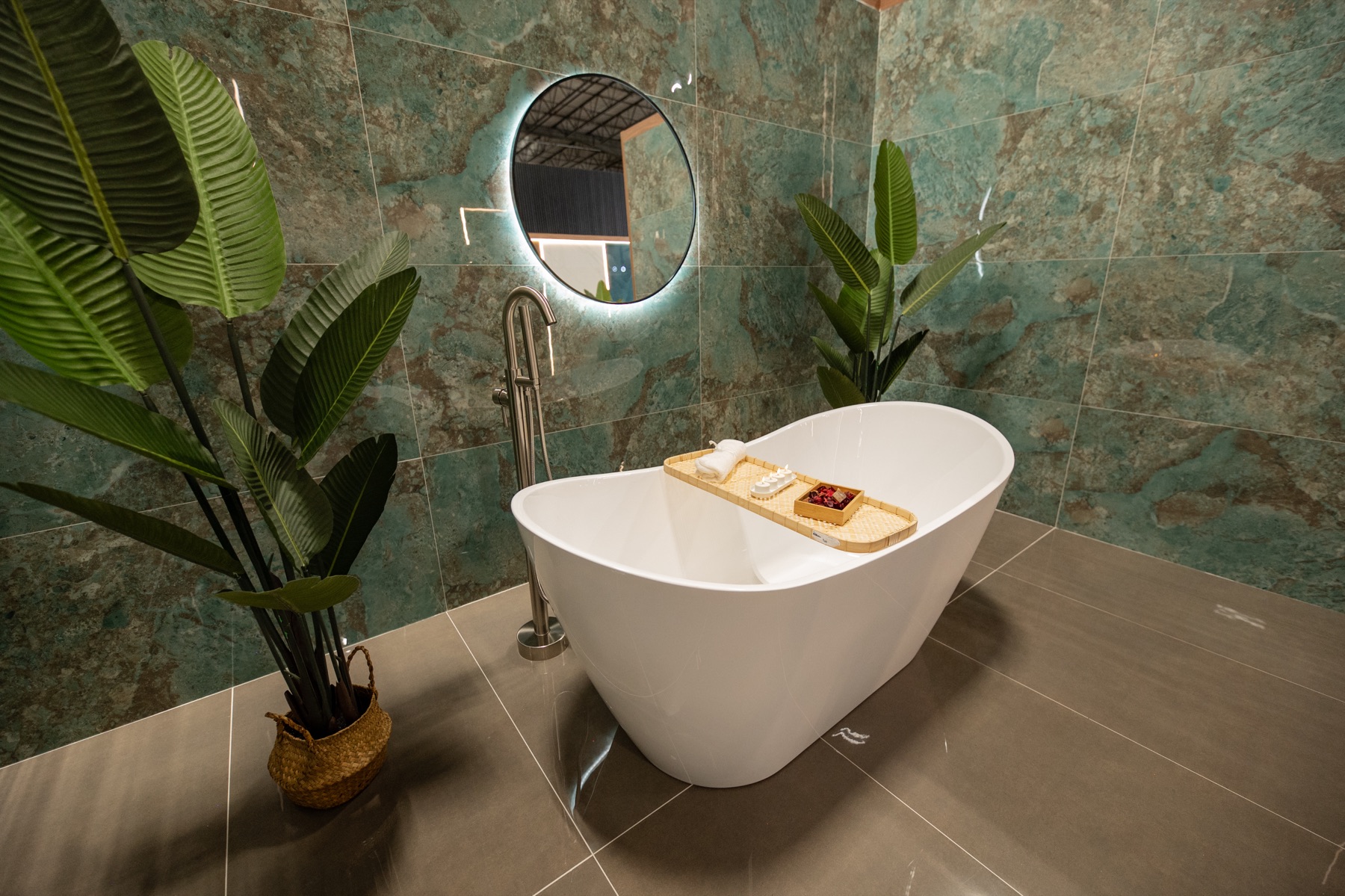Green porcelain bathtub room setting